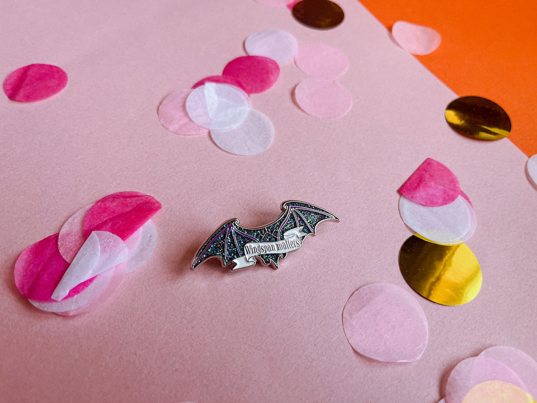 Wingspan Matters Glitter Pin Badge